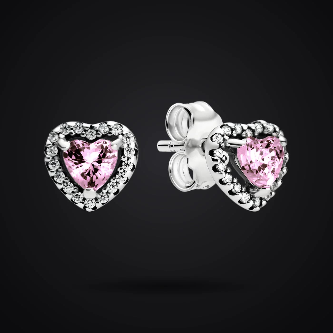 Pink Hearts earrings on a dark background
