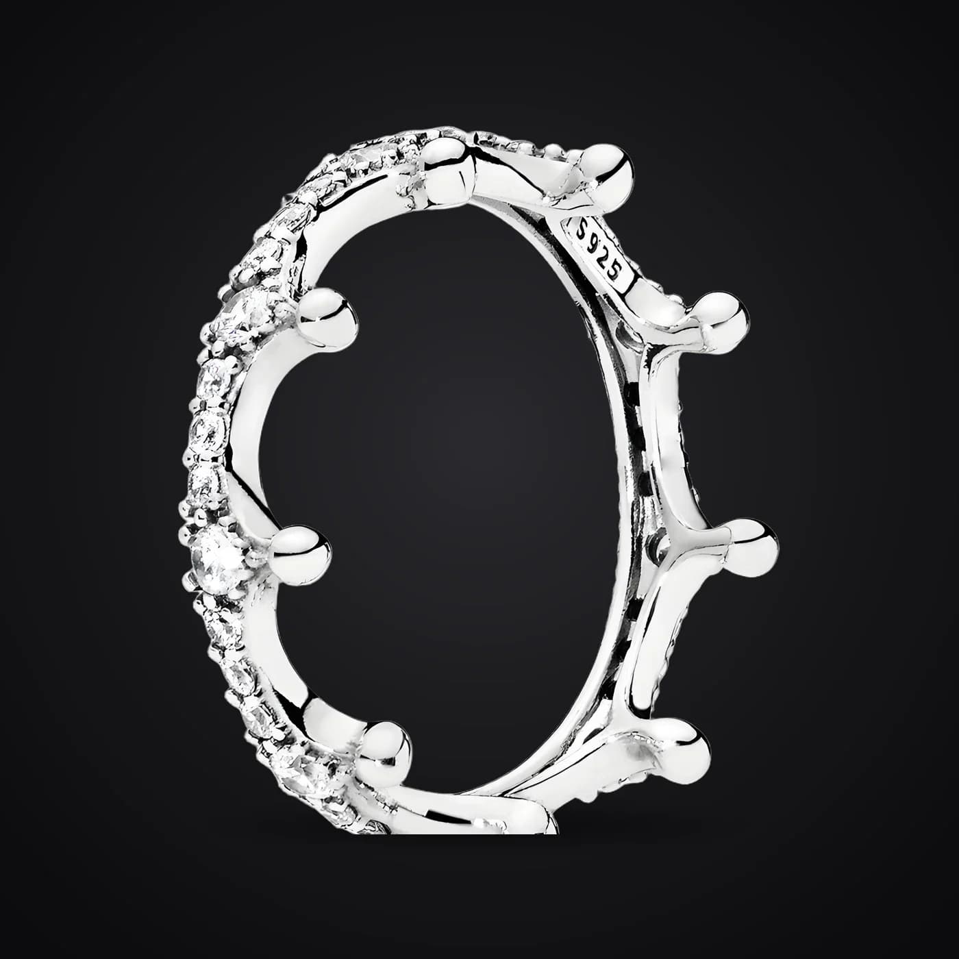 Crown ring on a dark background