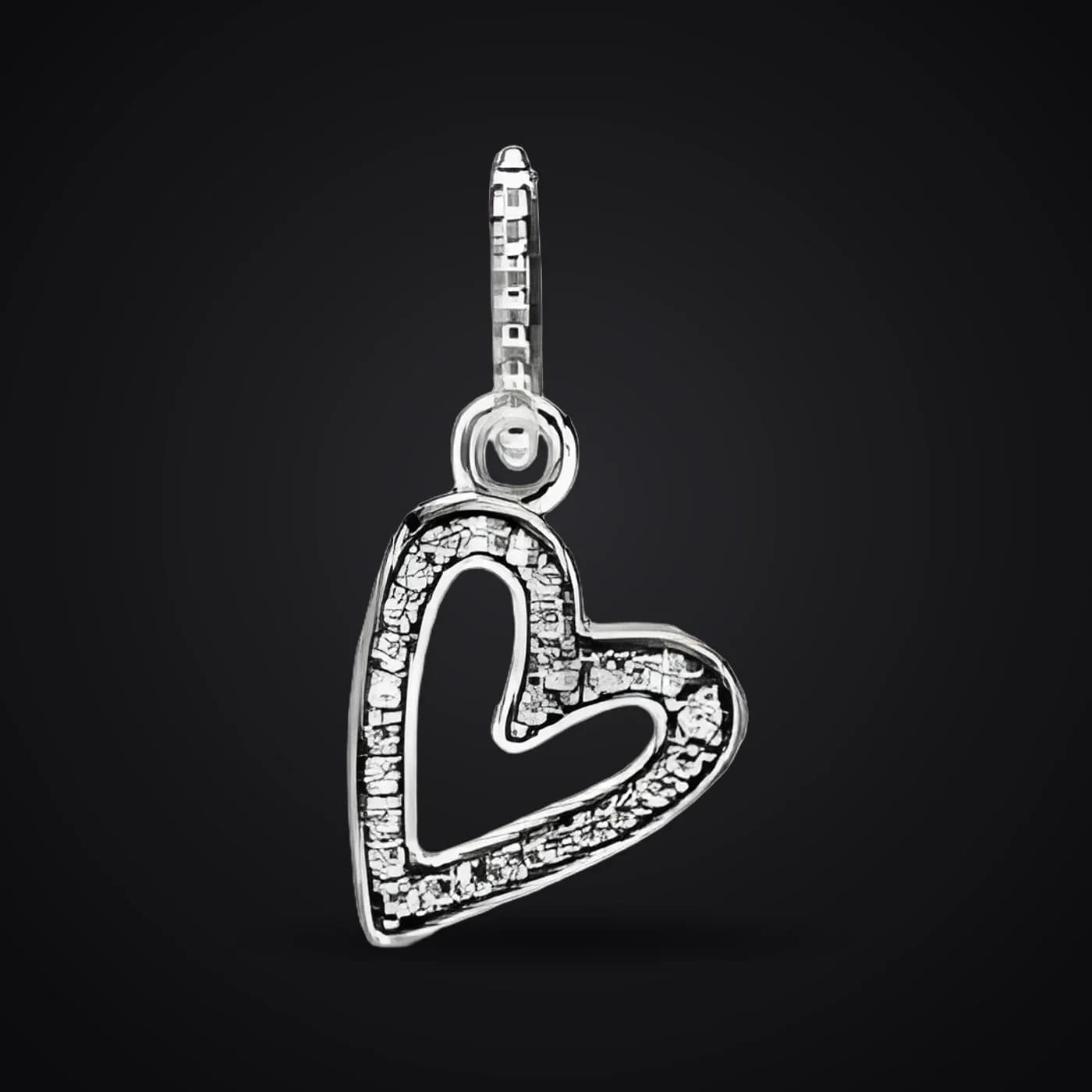 Open Heart pendant on a dark background