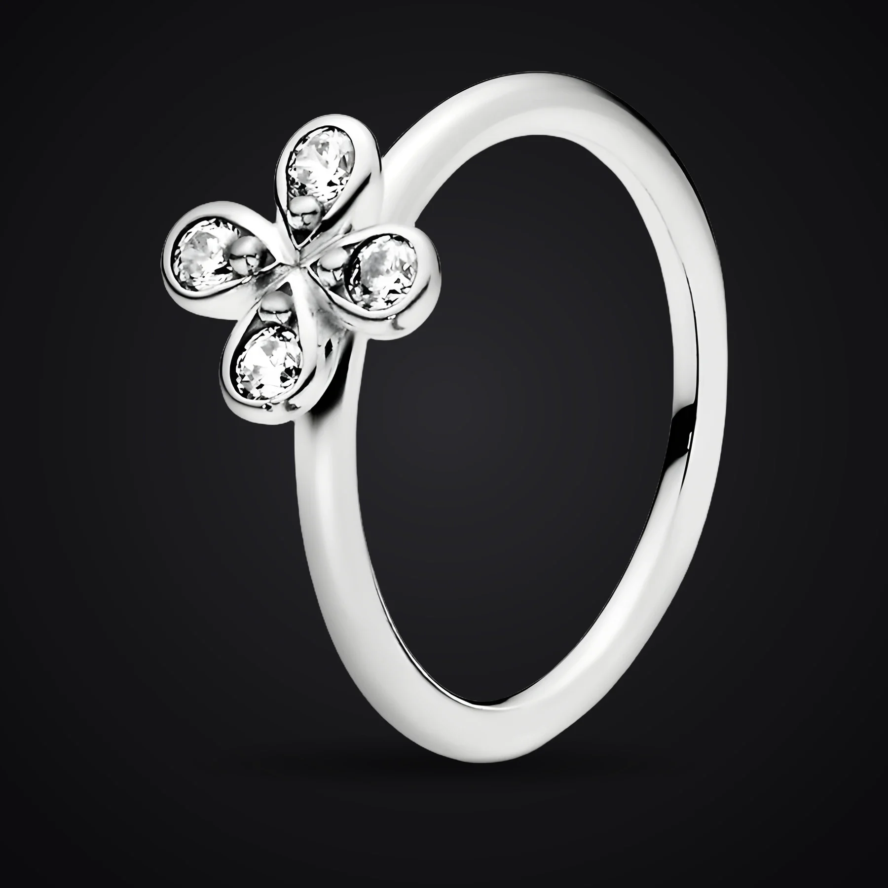 Clover ring on a dark background