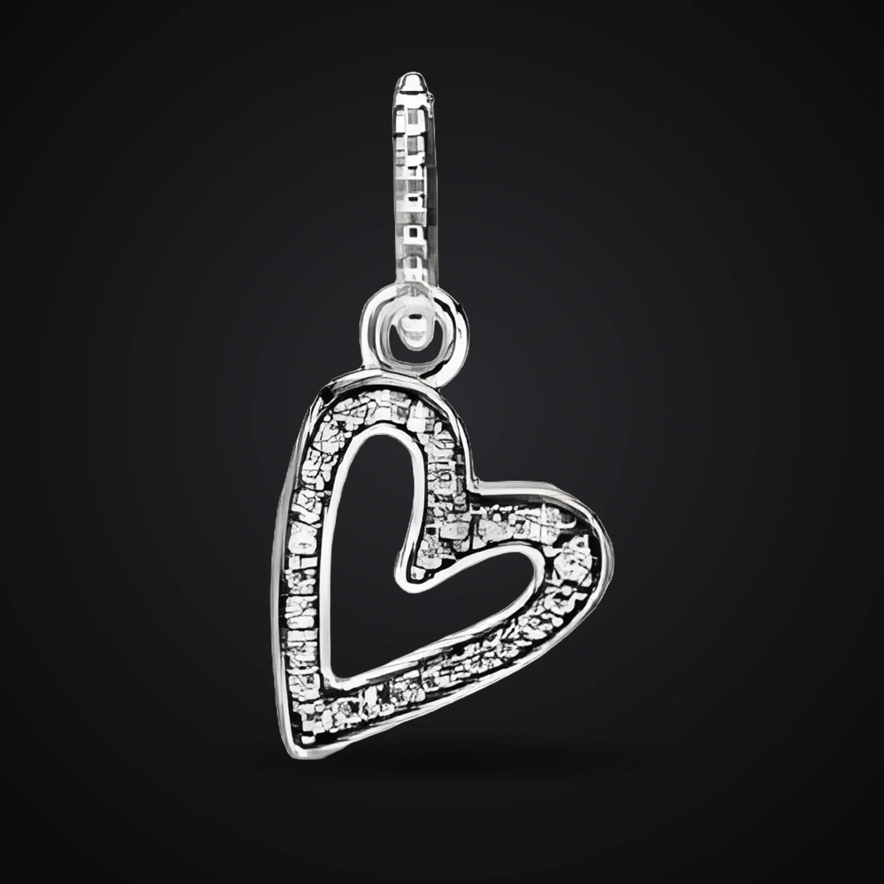 Open Heart pendant on a dark background