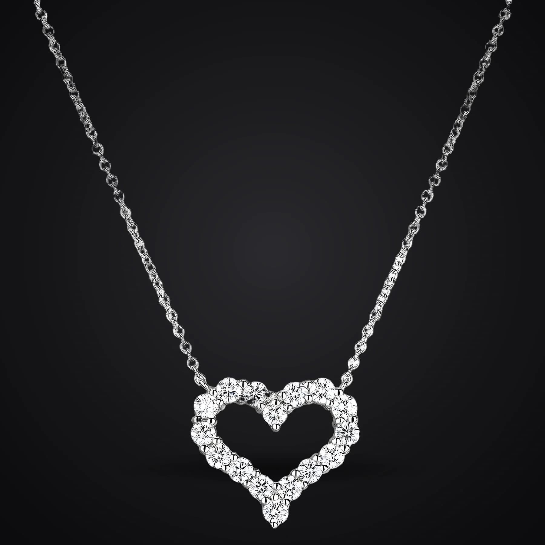 Open Heart necklace on a dark background