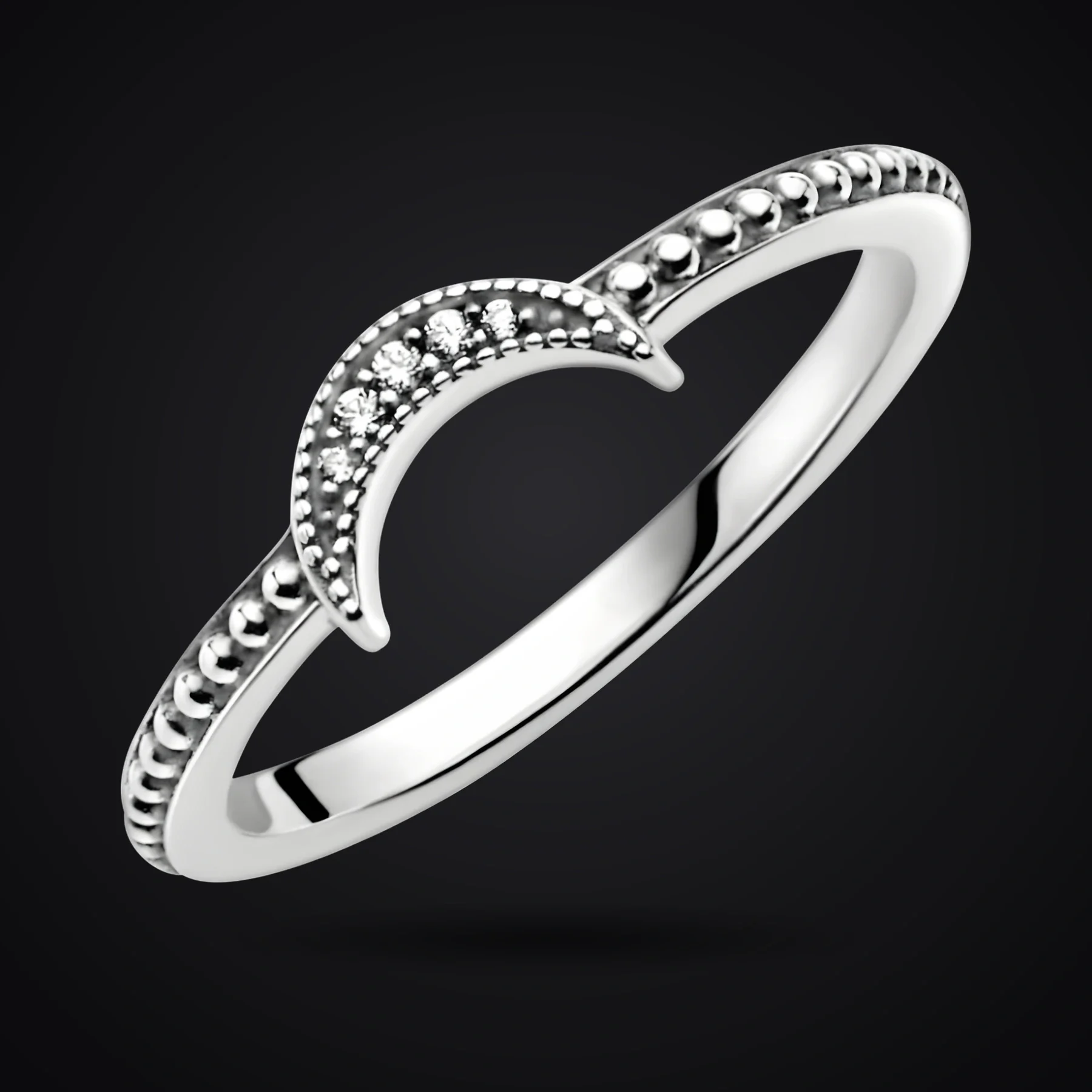 Crescent Moon ring on a dark background