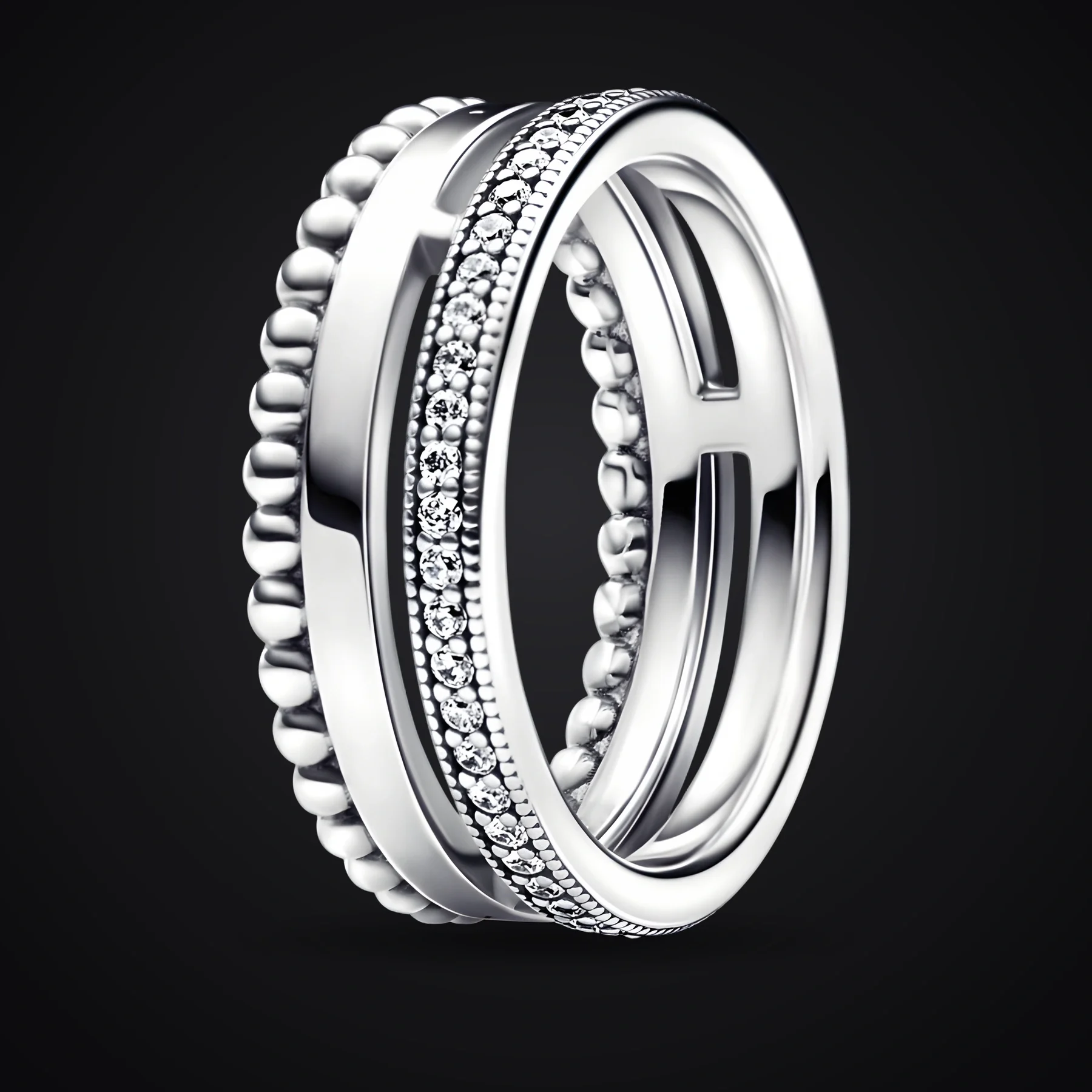 Triple Band Crown ring on a dark background