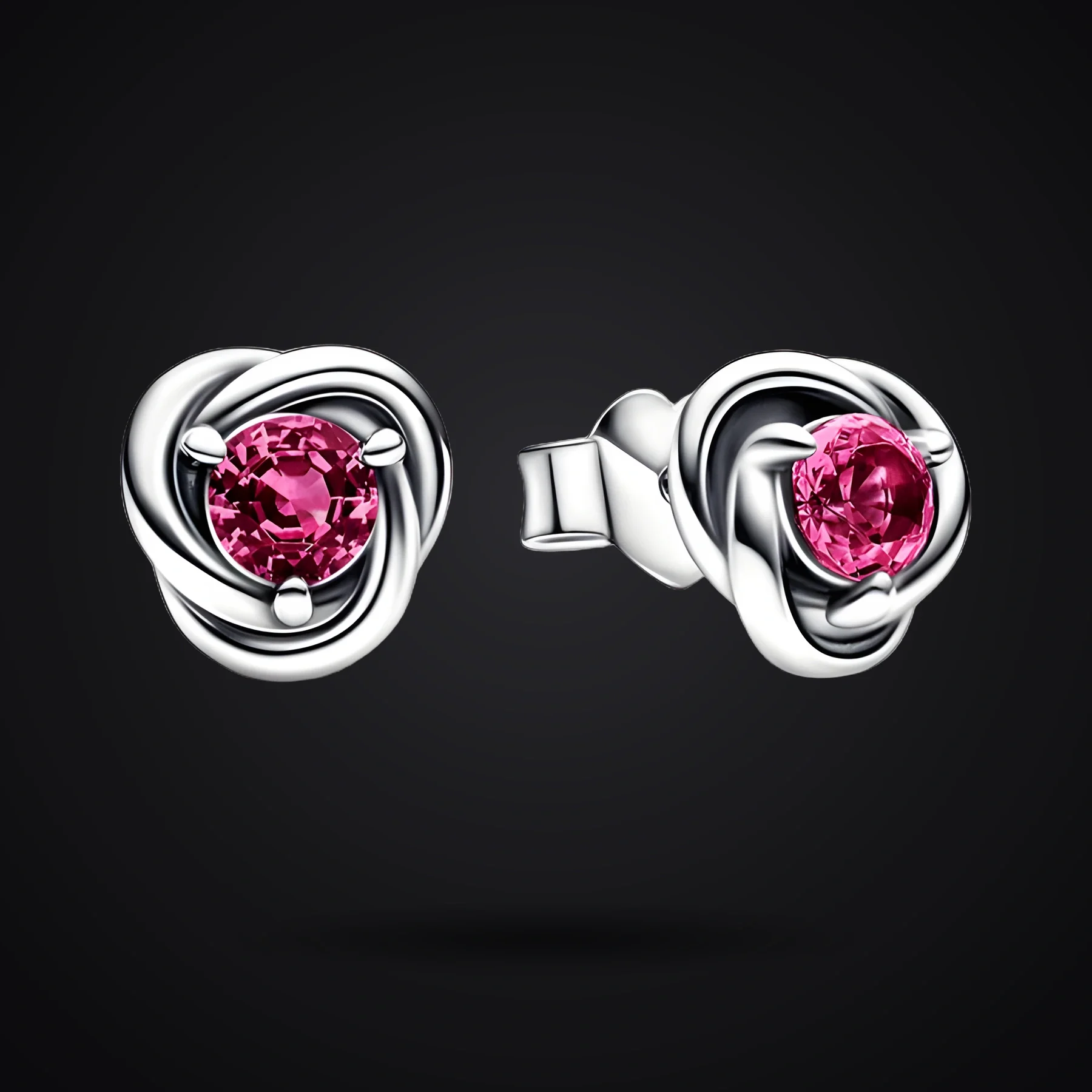 Pink Eternity Circle earrings on a dark background