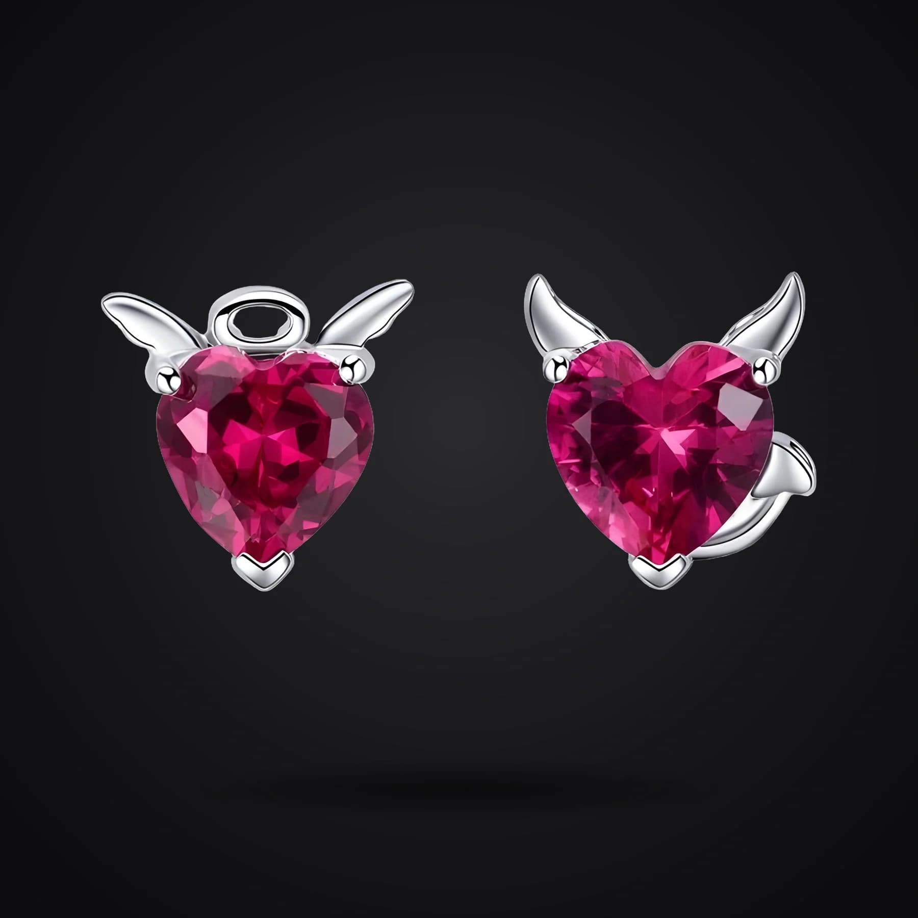 Angel & Demon earrings on a dark background