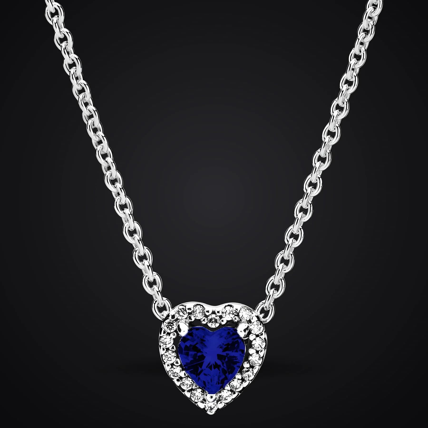 Blue Heart necklace on a dark background