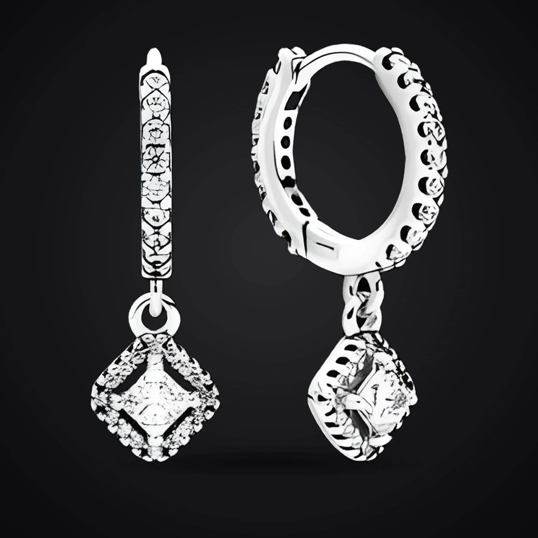 Sparkle earrings on a dark background